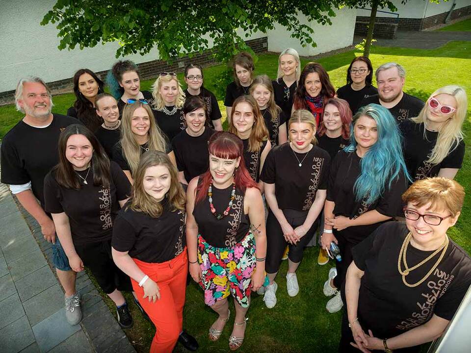 high shot of group of fashion students