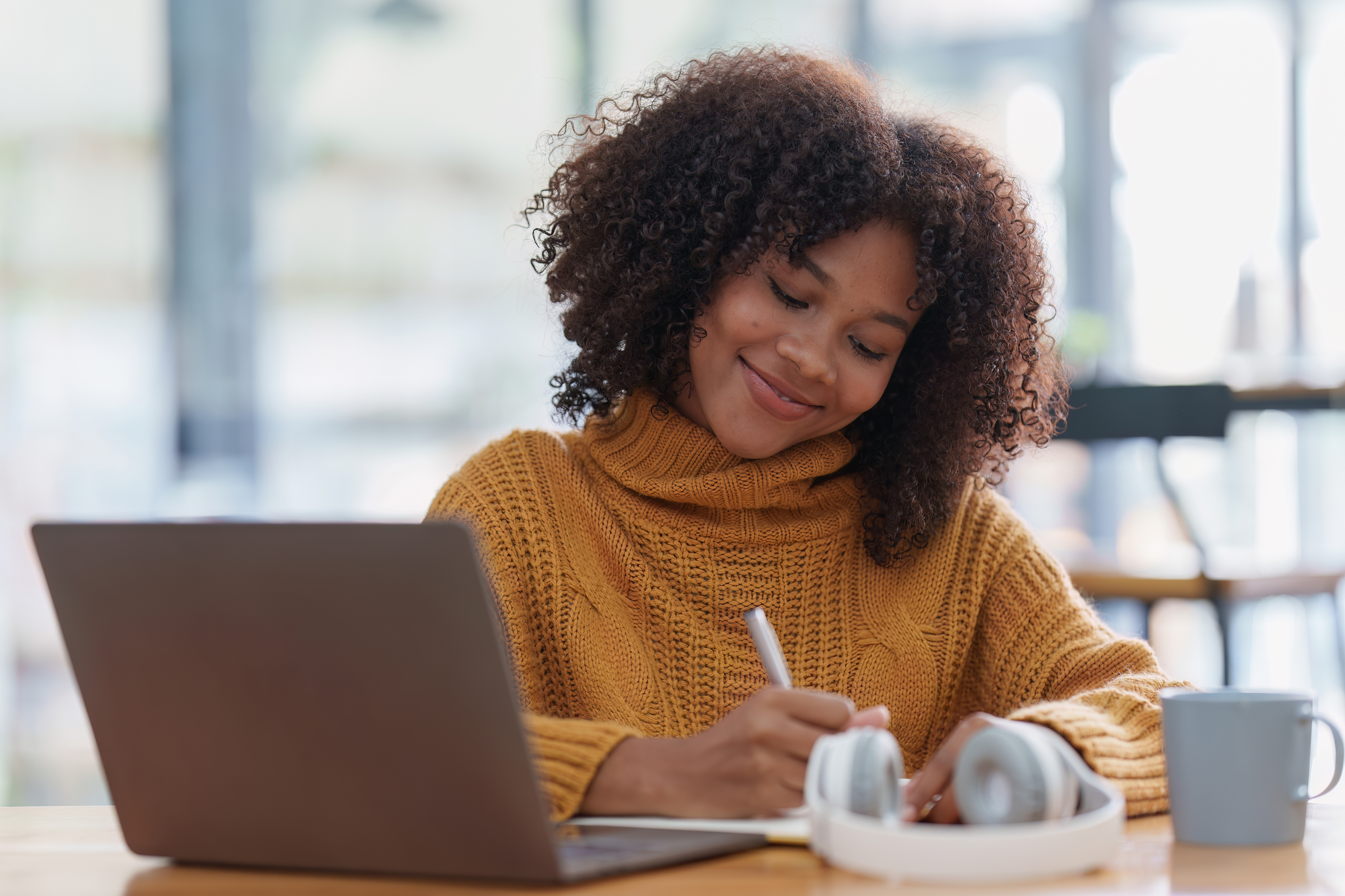 Female student working on laptop 