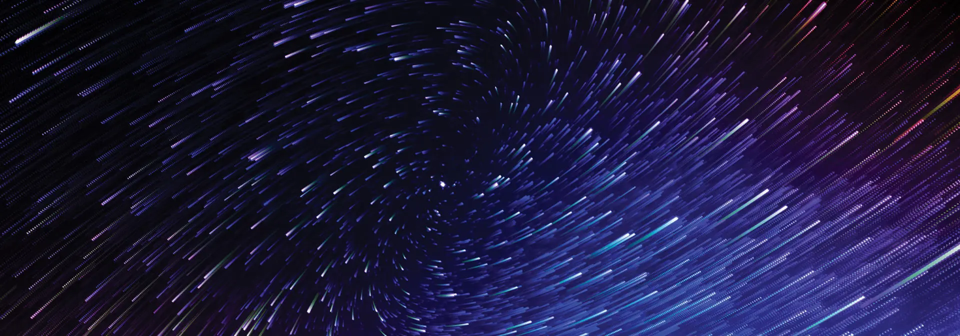 swirling points of light in space