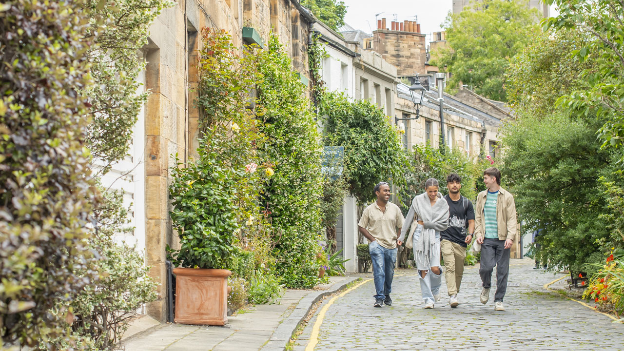 Student chat as the walk along Circus Lane in Edinburgh.