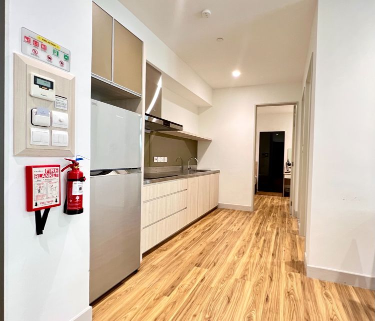 Living hall and kitchen Living hall and kitchen, showing wooden floot and cupboards