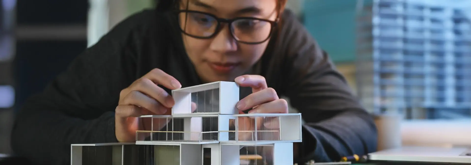 student working on architecture model