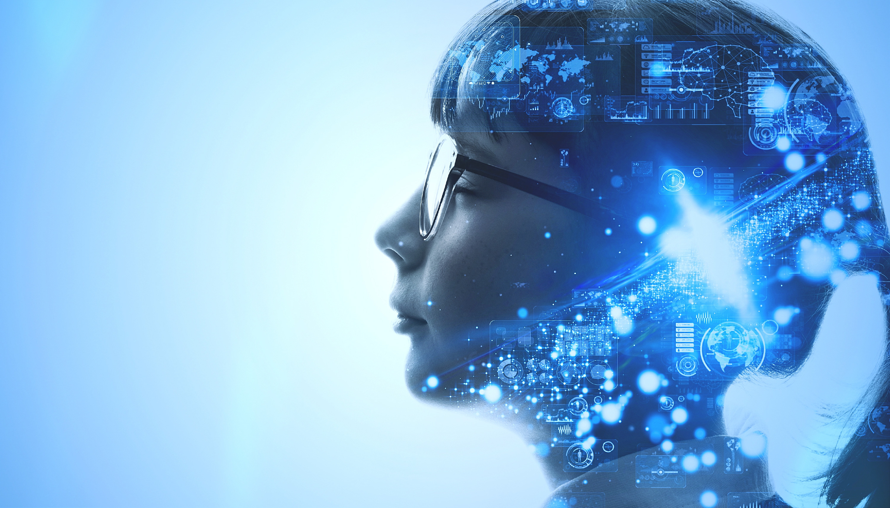 A stylised human head, overlaid with technological elements.