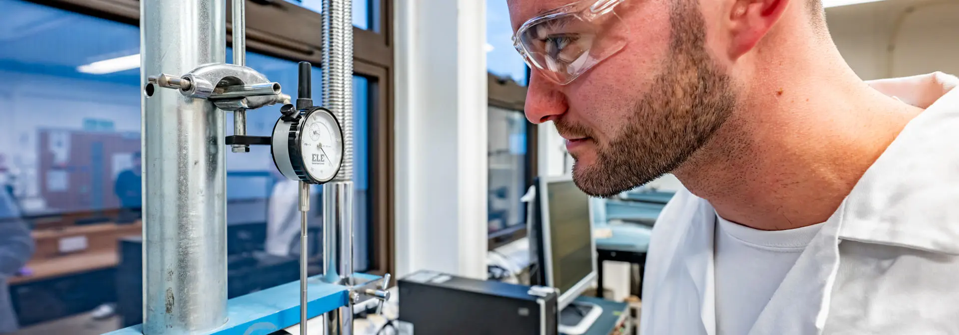 Student performing a pressure test in a lab