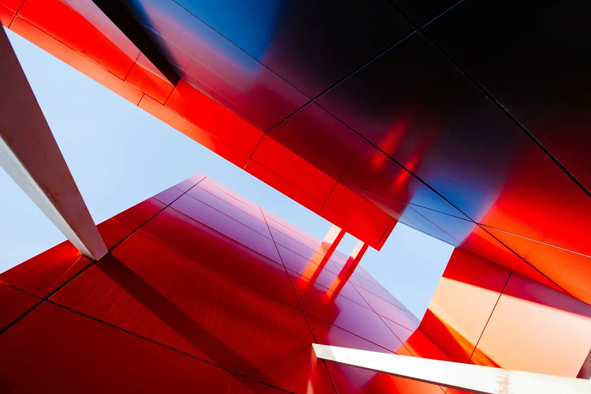 Modern building looks red in the sunlight