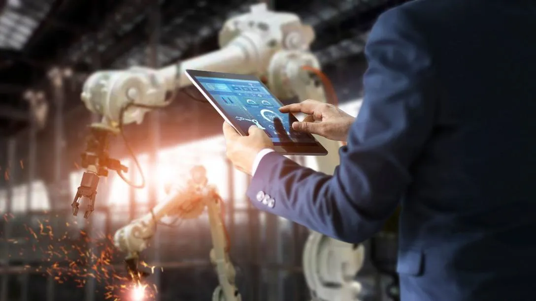 Robot arm and person with tablet